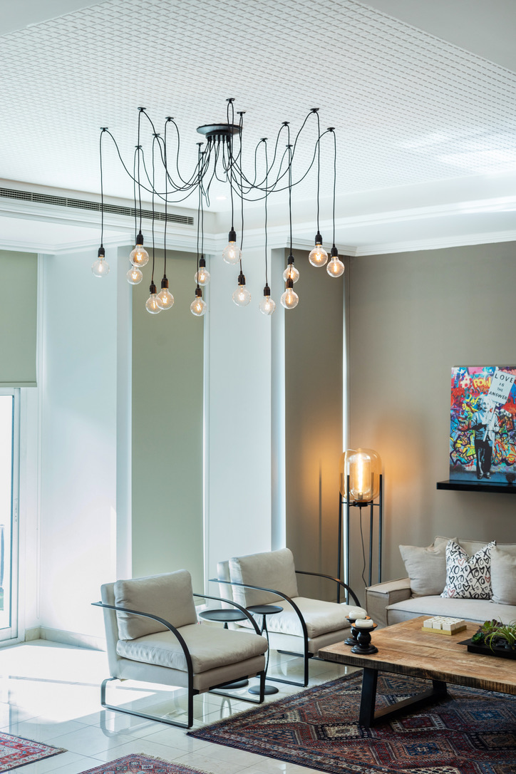 Colorful flower arrangement with wall artwork