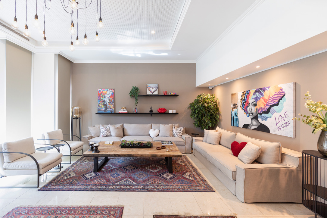 Living area with colorful artwork in private residence