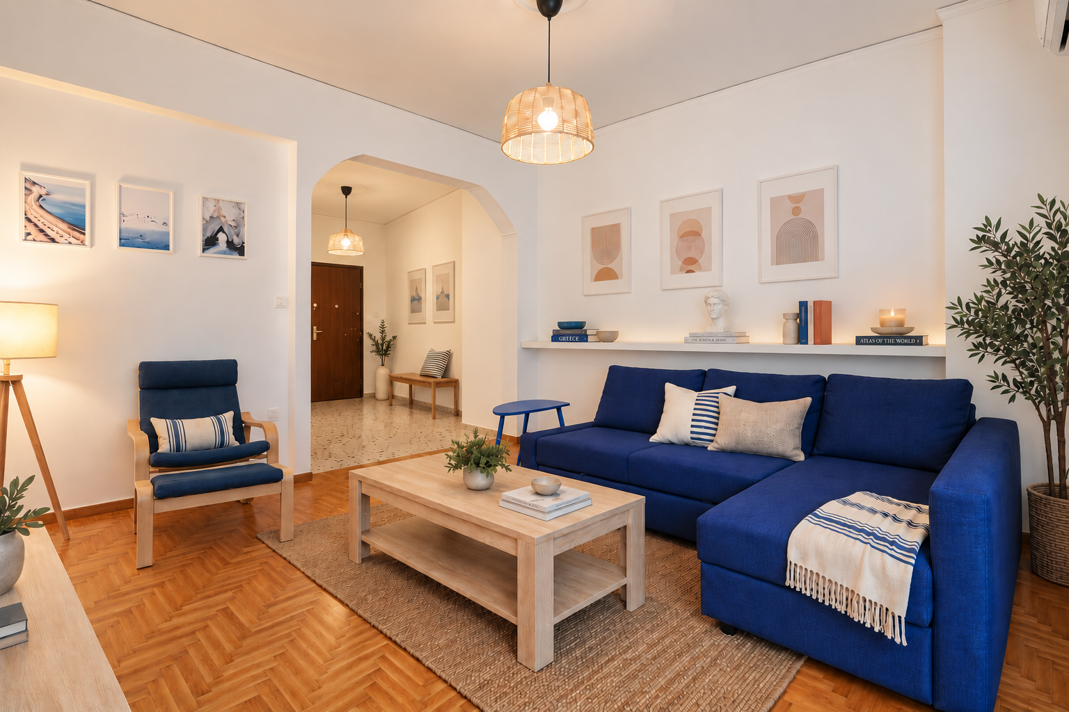 Contemporary Athens apartment interior with bold blue accents, natural textures and botanical details